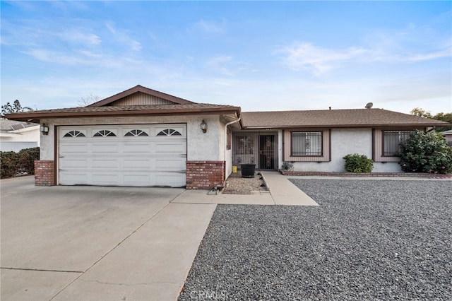 ranch-style home with a garage