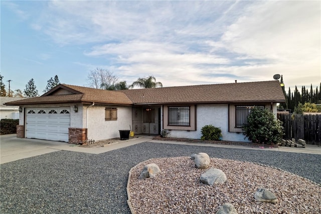 ranch-style home with a garage