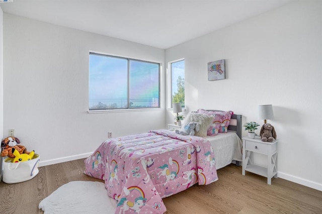 bedroom featuring hardwood / wood-style floors