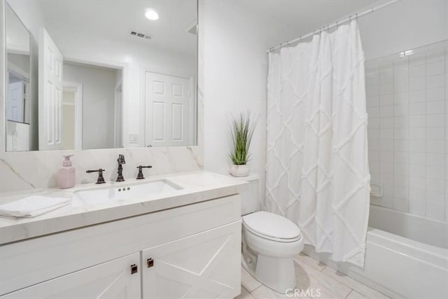 full bathroom with toilet, vanity, shower / bathtub combination with curtain, and tile patterned flooring