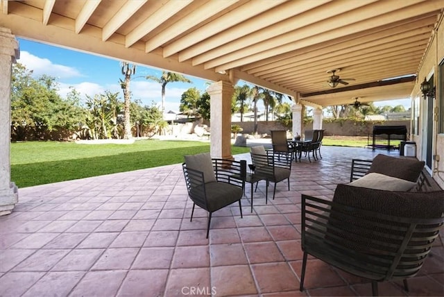 view of patio featuring ceiling fan