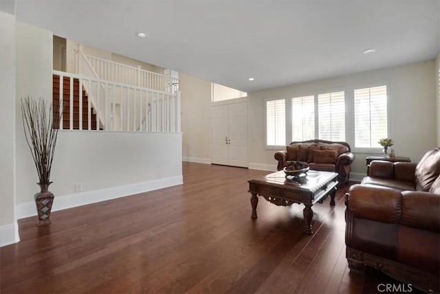 living room featuring dark hardwood / wood-style flooring