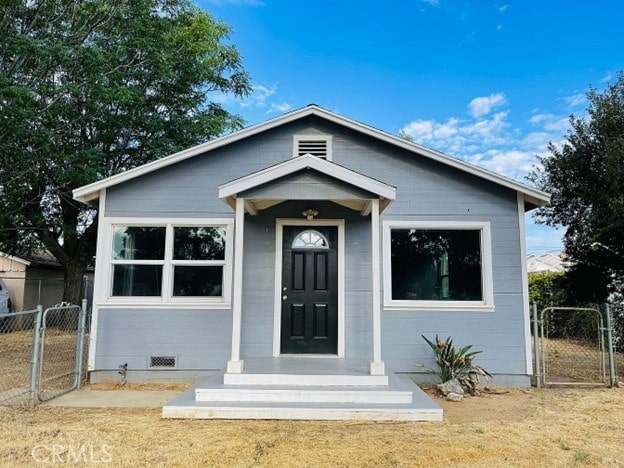 bungalow with a front lawn