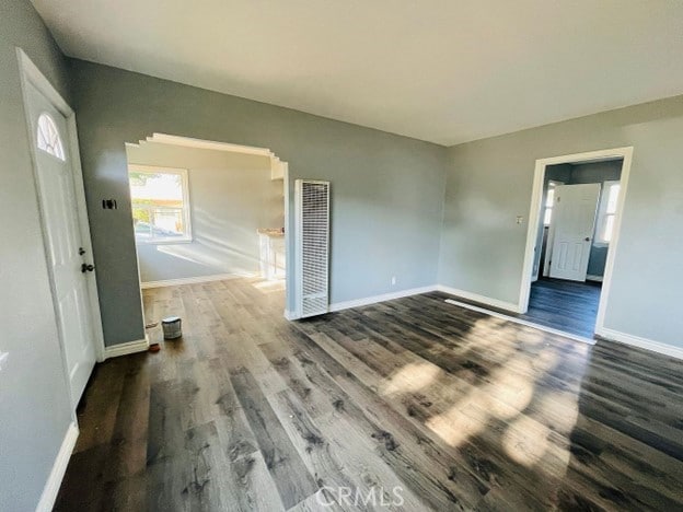 spare room with wood-type flooring