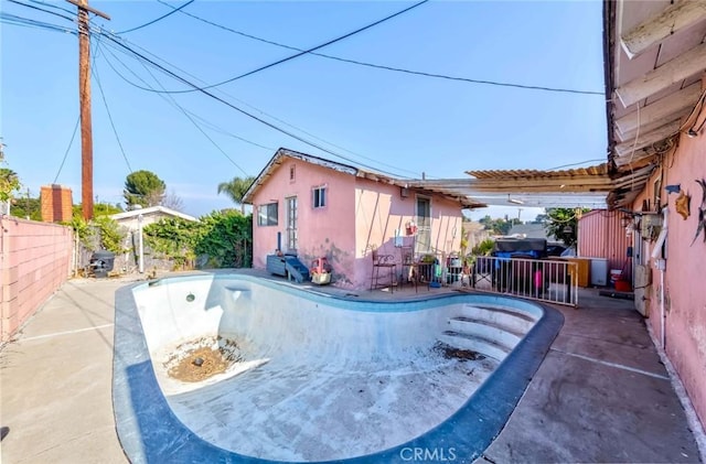 view of pool with a patio area and a pergola