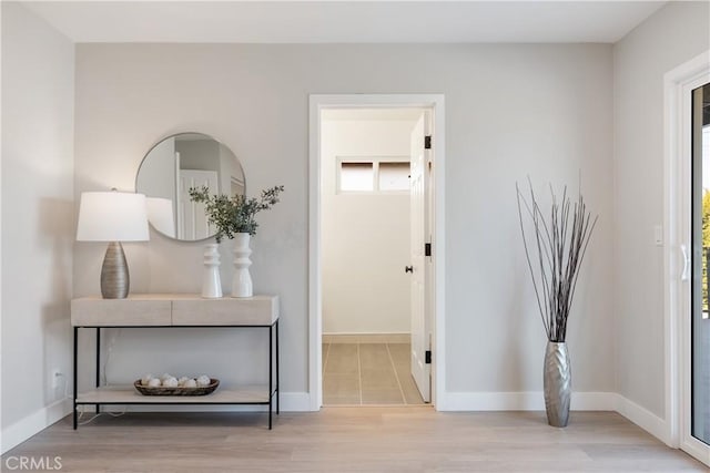 hallway featuring light wood-type flooring