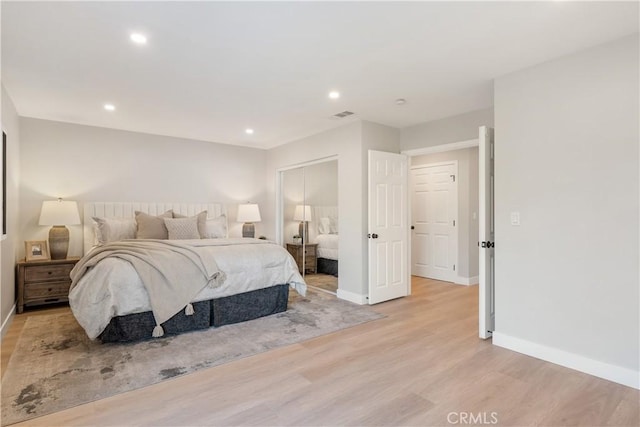 bedroom with light hardwood / wood-style flooring