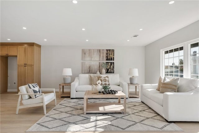 living room with light hardwood / wood-style floors