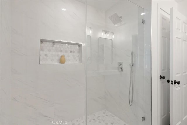 bathroom featuring walk in shower