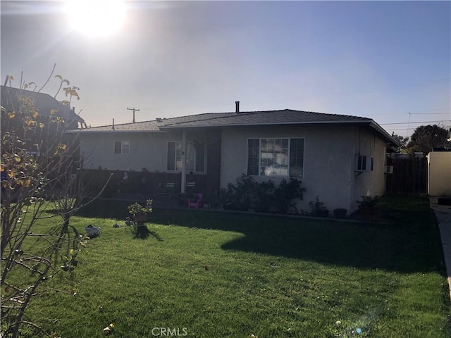 view of front of home with a front yard