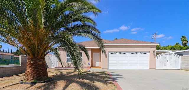 view of front of home with a garage