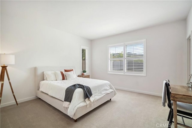 bedroom featuring carpet