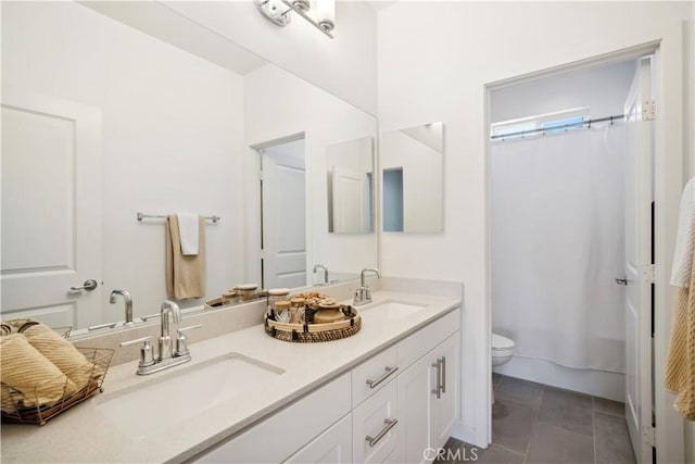 full bathroom featuring toilet, vanity, shower / tub combo with curtain, and tile patterned floors