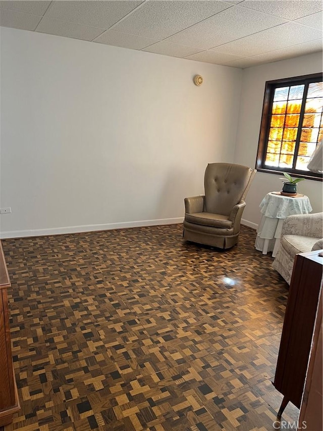 unfurnished room featuring dark parquet floors