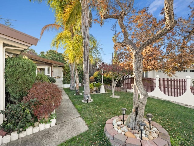 view of yard featuring a garage