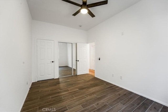 unfurnished bedroom with a closet and ceiling fan