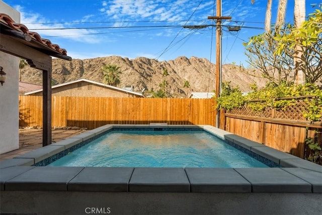 view of pool featuring a mountain view