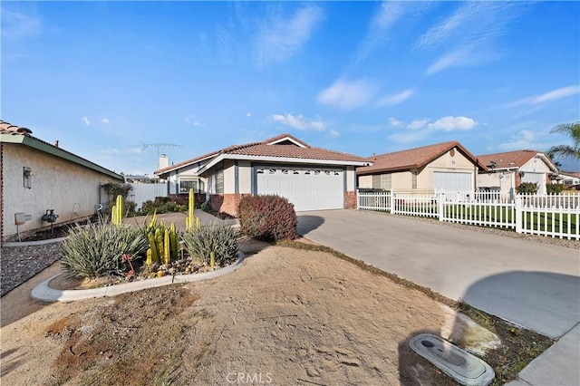 single story home featuring a garage