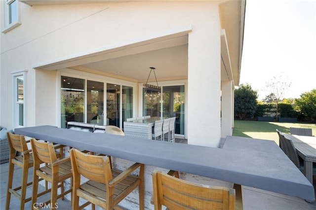 view of patio / terrace with an outdoor bar