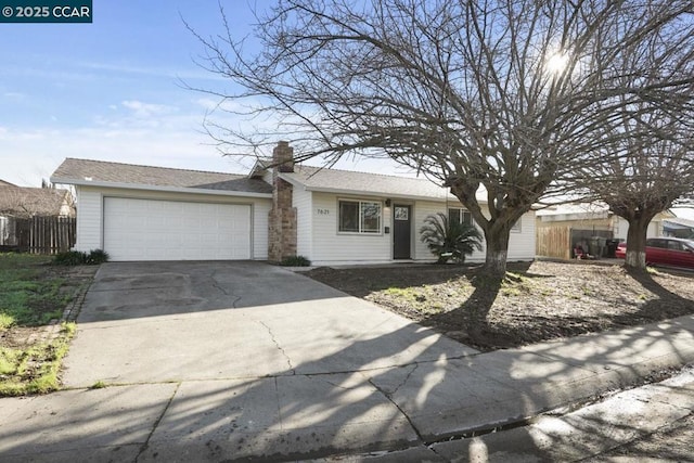 single story home with a garage