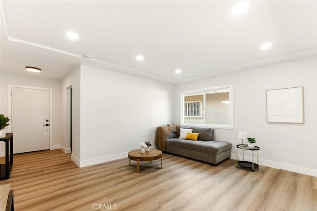 sitting room featuring light hardwood / wood-style floors