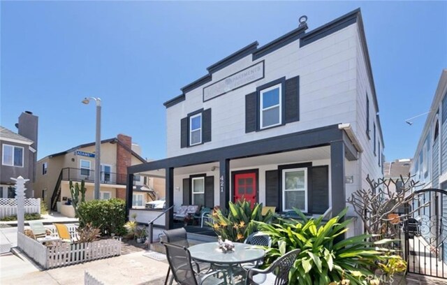 view of front of house with a patio area