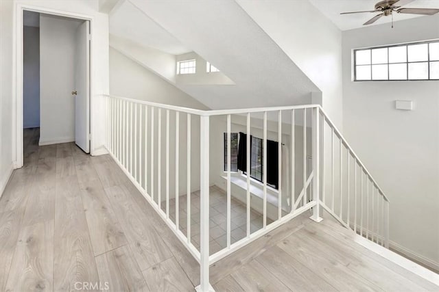 corridor featuring light hardwood / wood-style floors