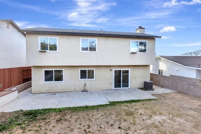 back of property featuring a patio