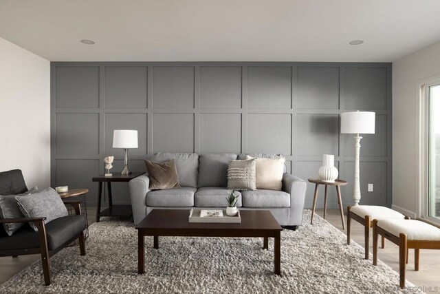 living room with light hardwood / wood-style flooring