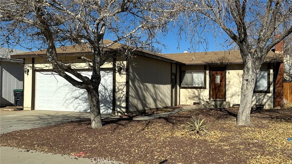 view of side of property featuring a garage