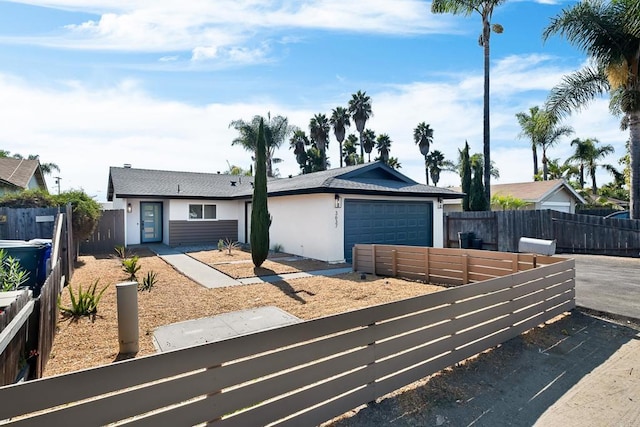 ranch-style home with a garage