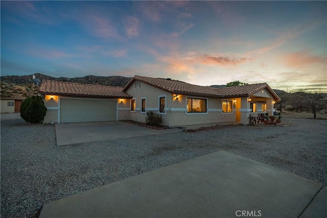 view of front of property featuring a garage