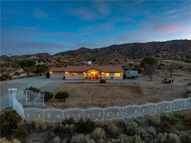 view of front of home with a mountain view