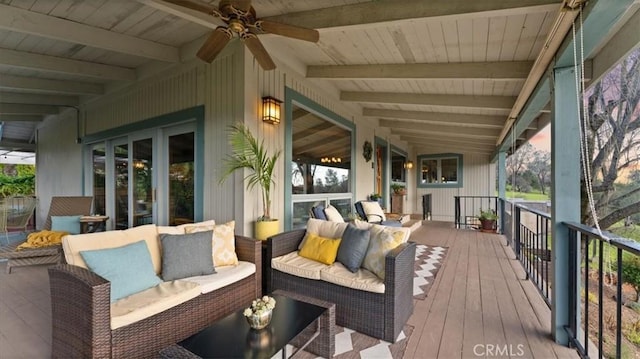 wooden terrace featuring an outdoor hangout area and ceiling fan