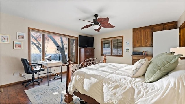 bedroom with ceiling fan and wood-type flooring