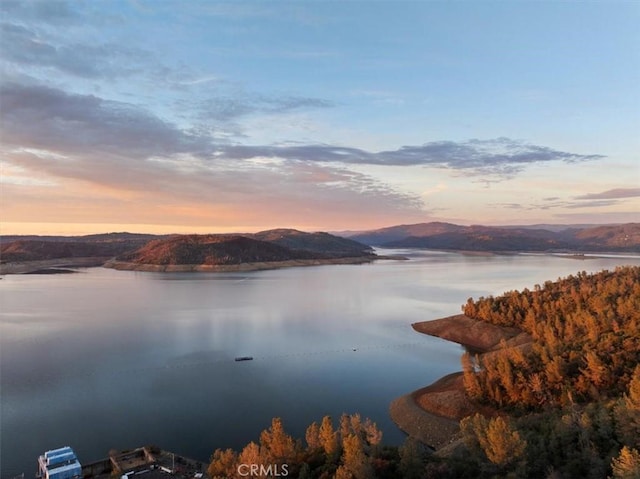 property view of water featuring a mountain view