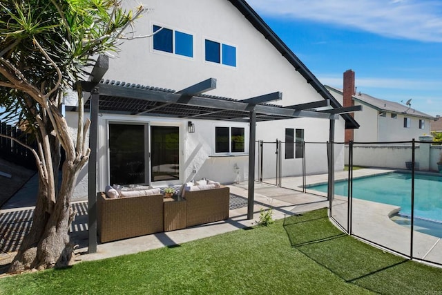 back of property with a patio area, an outdoor hangout area, and a pergola