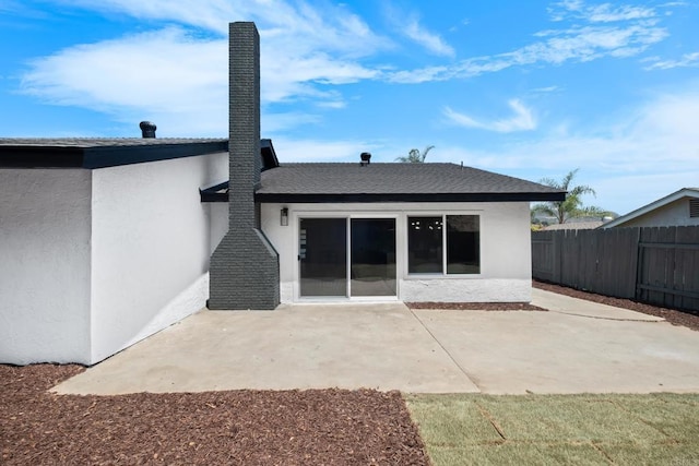 rear view of property with a patio