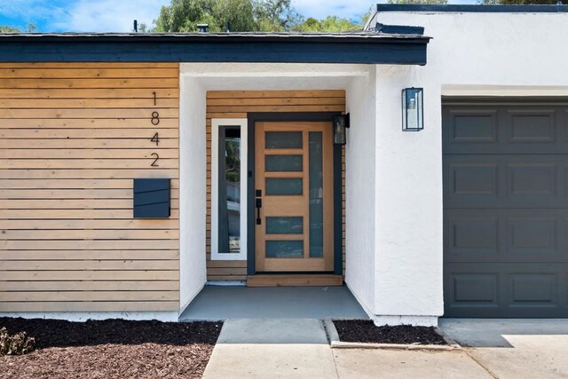 entrance to property with a garage