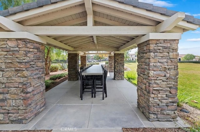 view of patio / terrace featuring a gazebo and outdoor dining area