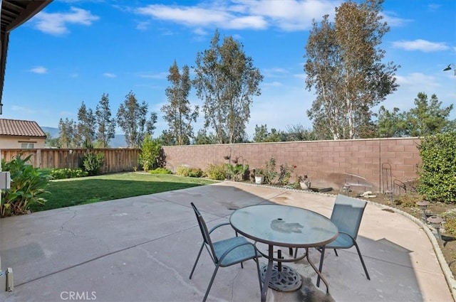 view of patio with a fenced backyard