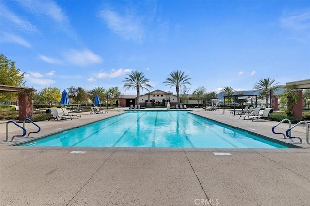 pool with a patio area