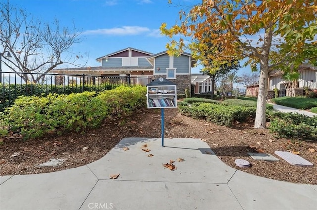 exterior space with a patio and fence