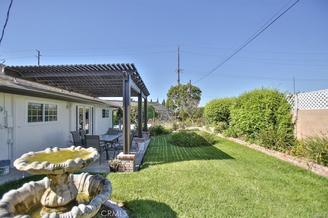 view of yard with a patio and a pergola