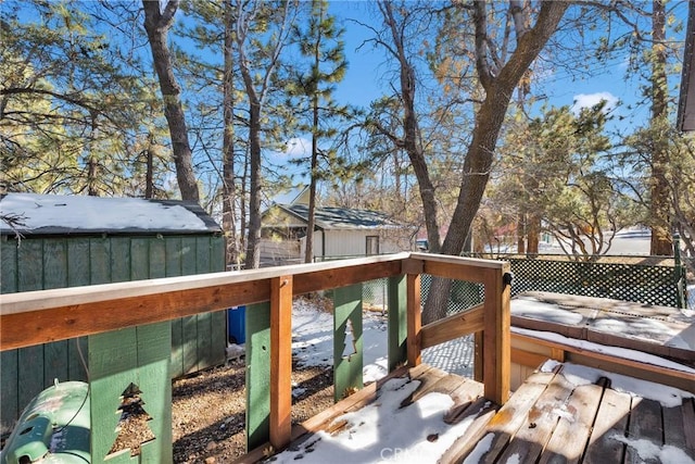 view of snow covered deck