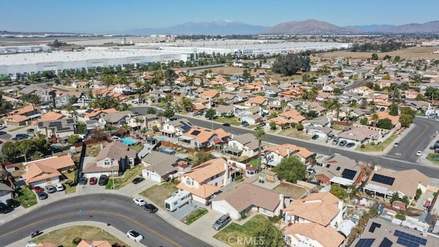 birds eye view of property with a residential view and a mountain view