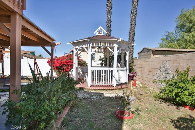 view of yard with a gazebo and a fenced backyard