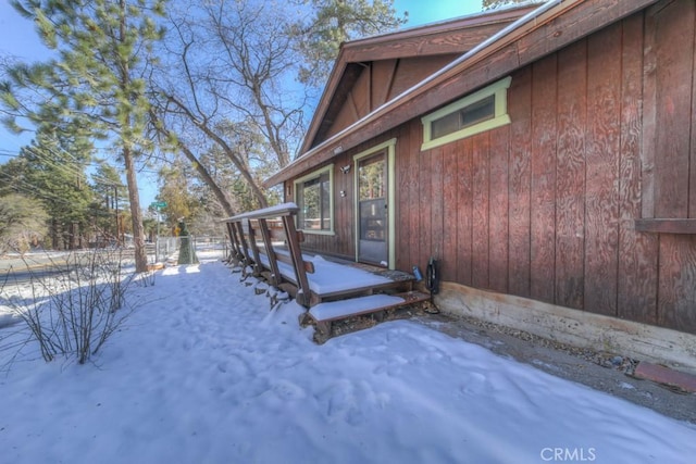 view of snow covered property