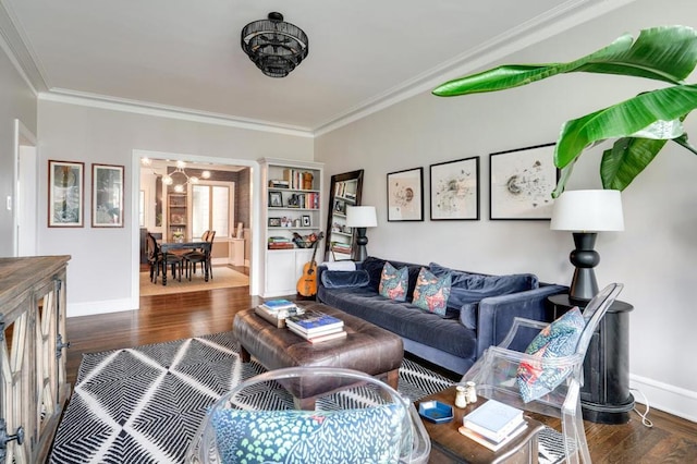 living room featuring dark wood-type flooring and ornamental molding