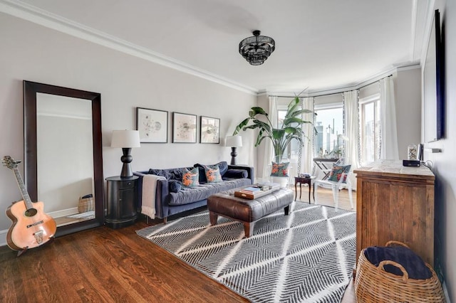 living room with dark hardwood / wood-style flooring and ornamental molding